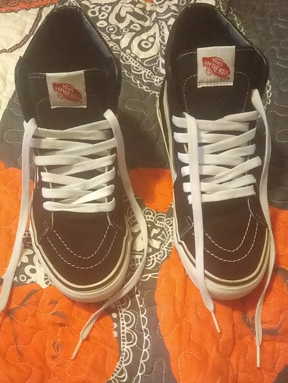 Vans Black and White High-Top Skate Sneakers